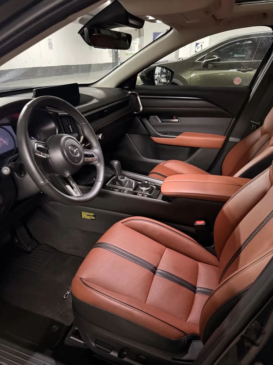 After: Pristine Mazda CX-50 interior with conditioned red leather seats