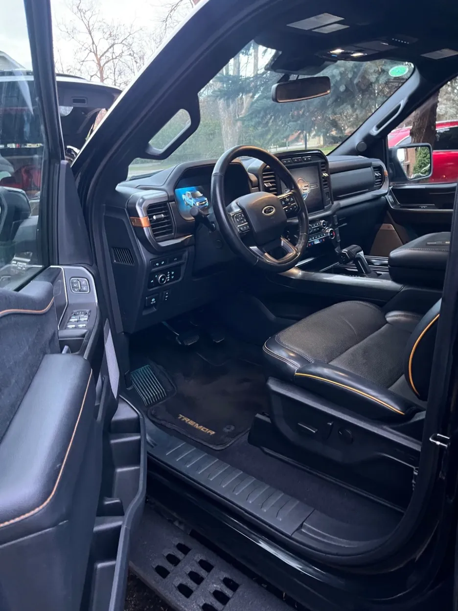 After: Clean Ford F-150 Tremor interior with detailed seats and floor